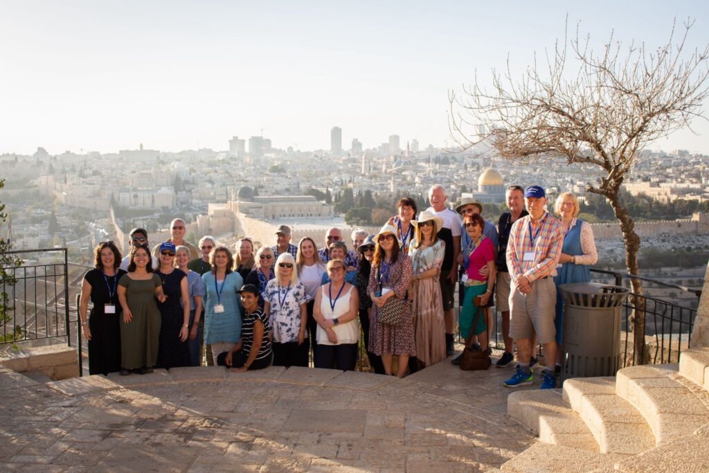 group of people on Mount of Olives overlooking Jerusalem